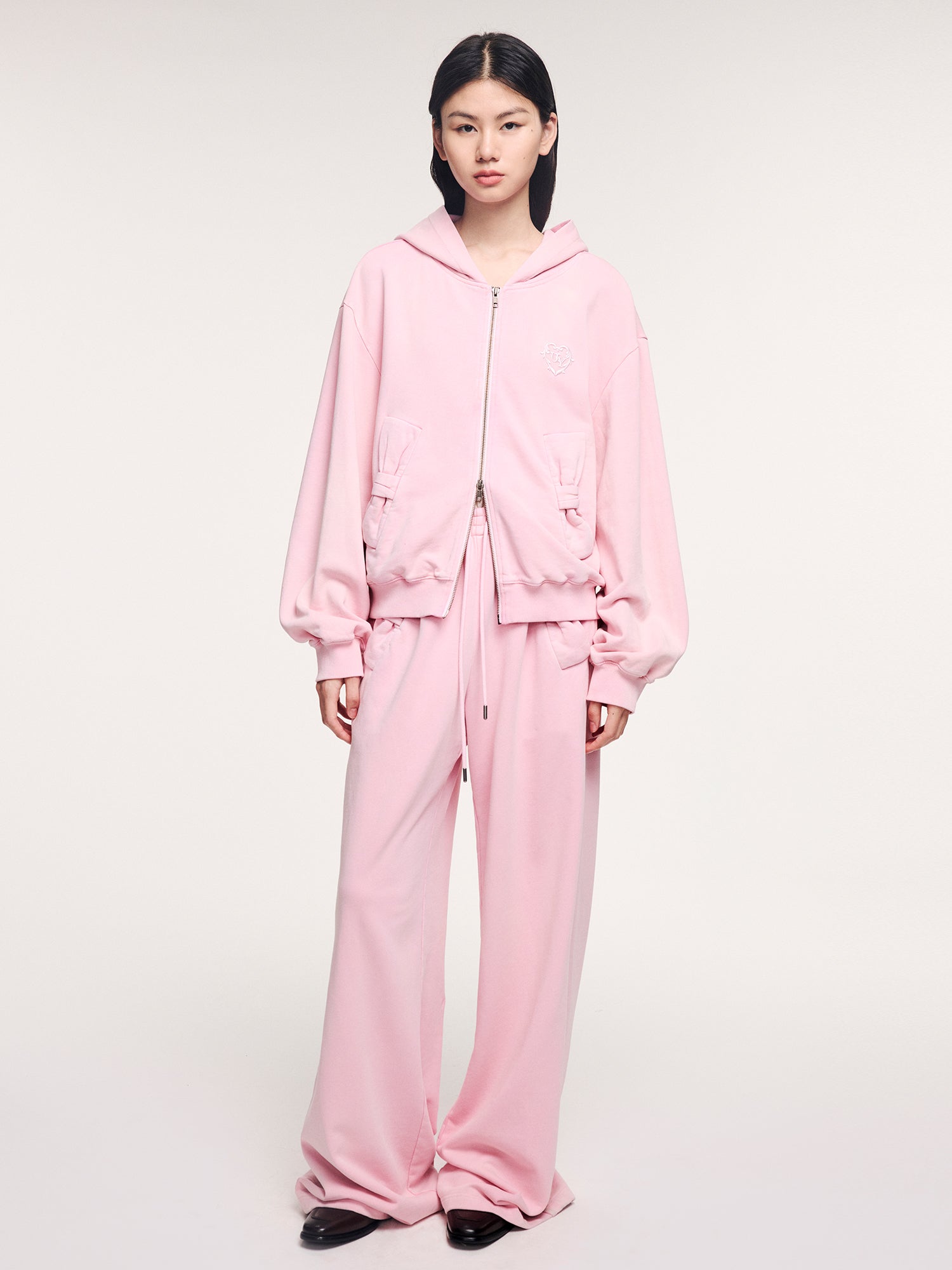 Washed sweatpants with bow detail at the waist