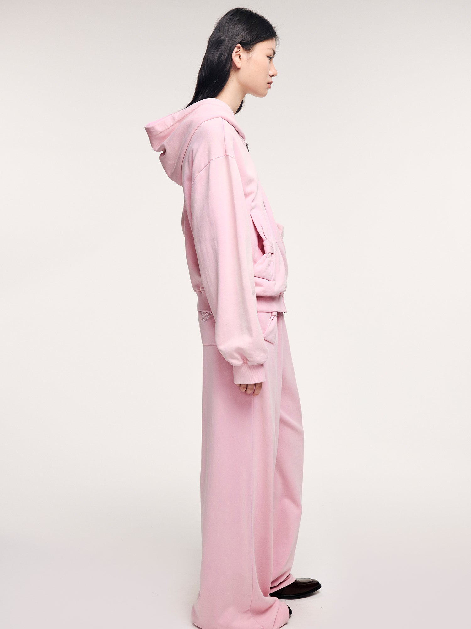 Washed sweatpants with bow detail at the waist