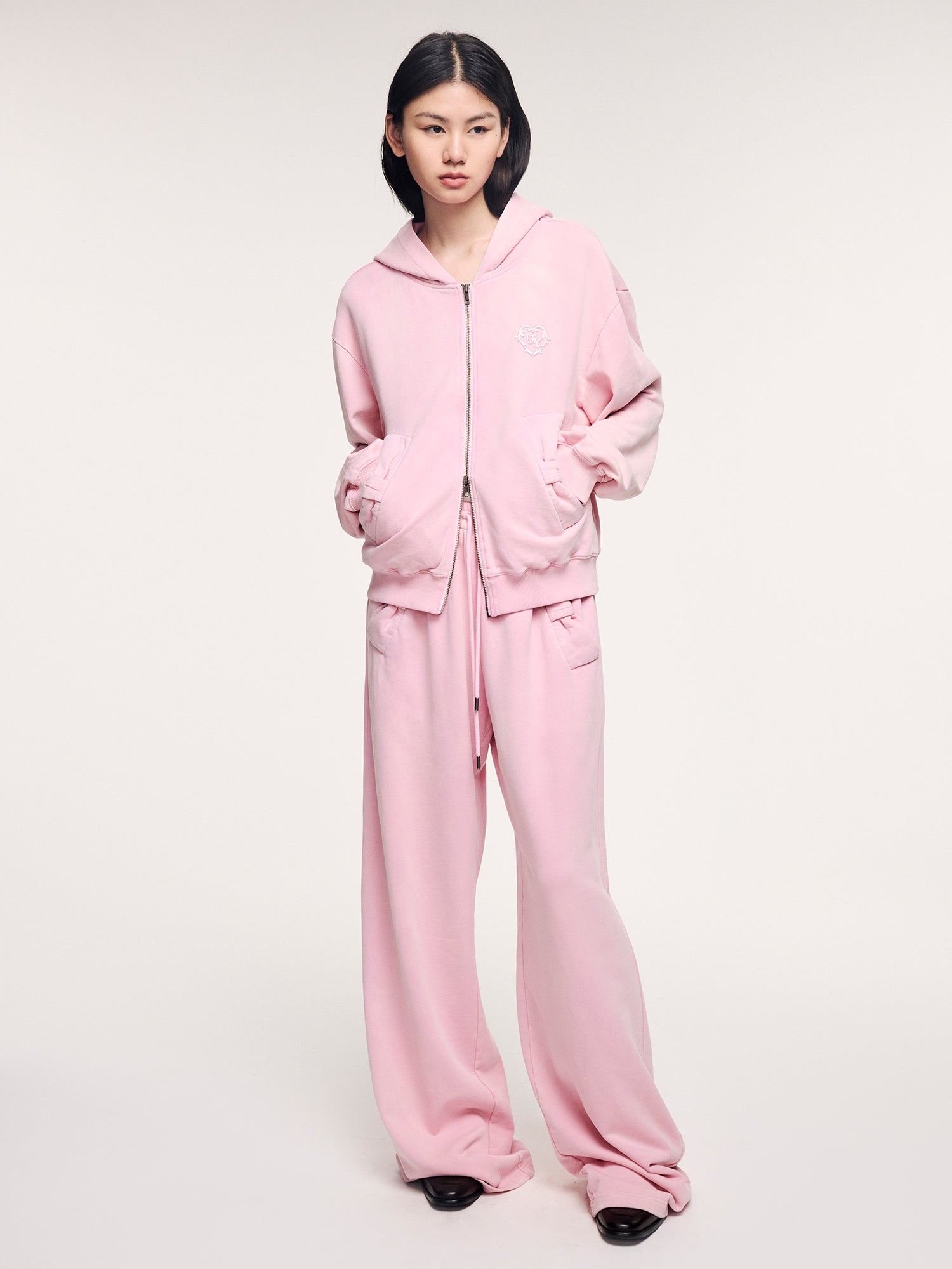 Washed sweatpants with bow detail at the waist