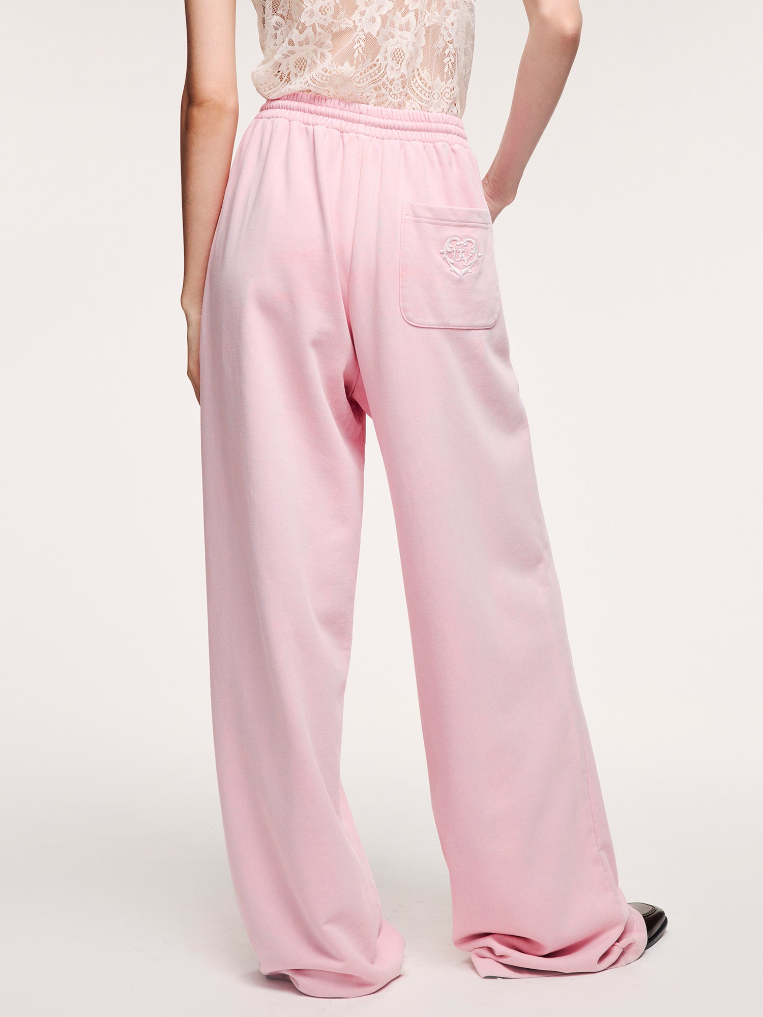 Washed sweatpants with bow detail at the waist