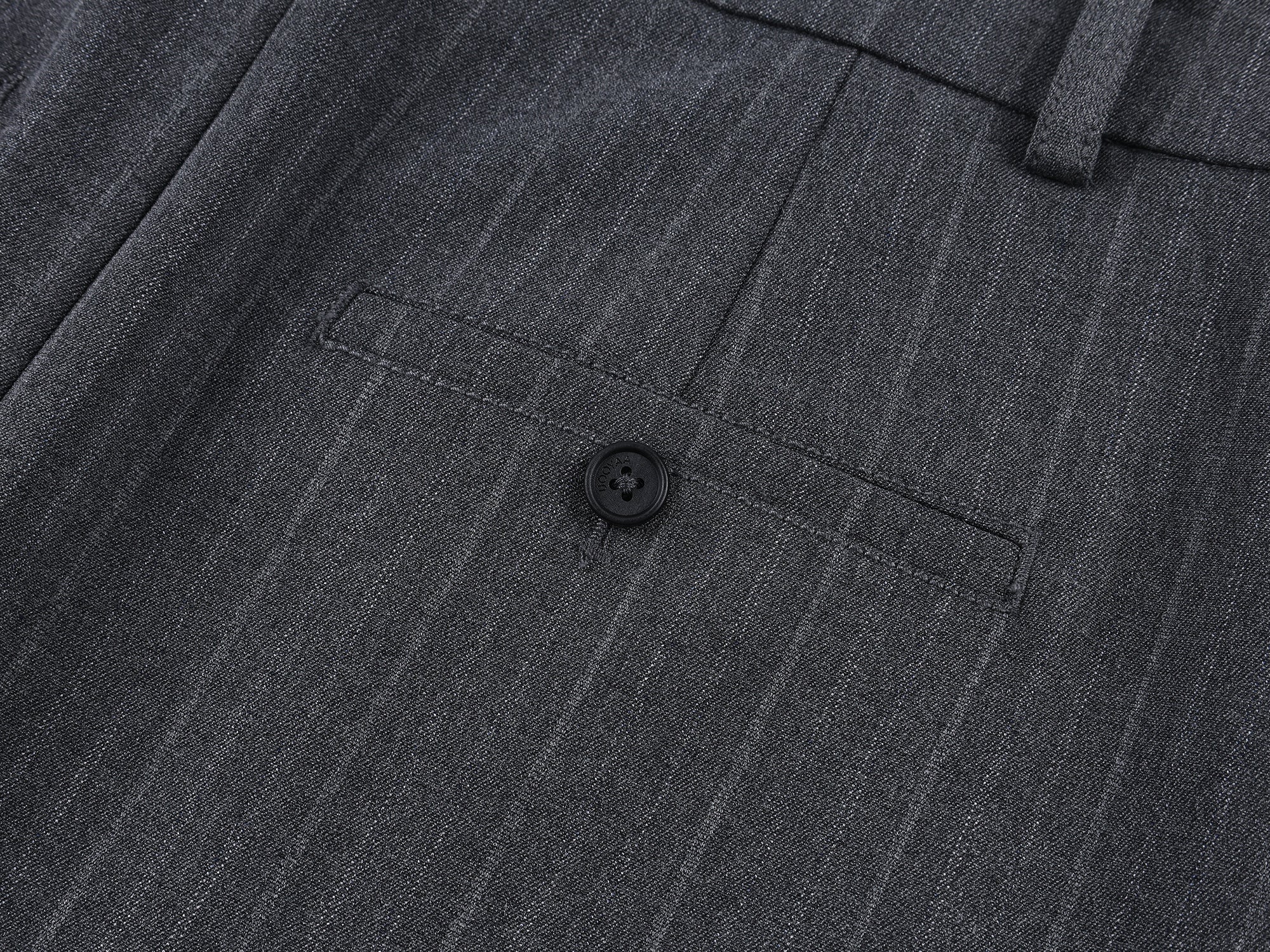 Tailored skirt with asymmetric ruffle trim