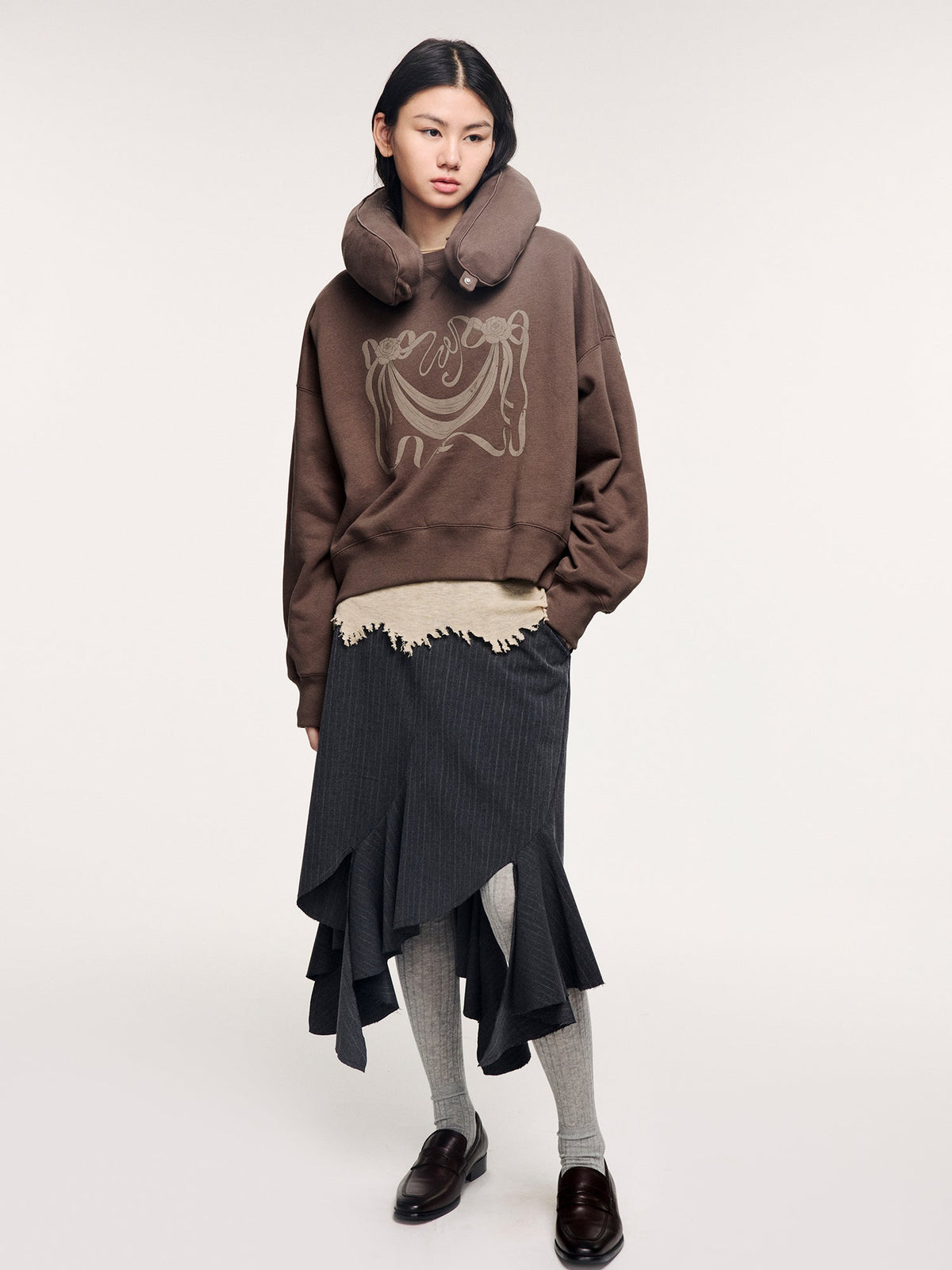 Tailored skirt with asymmetric ruffle trim