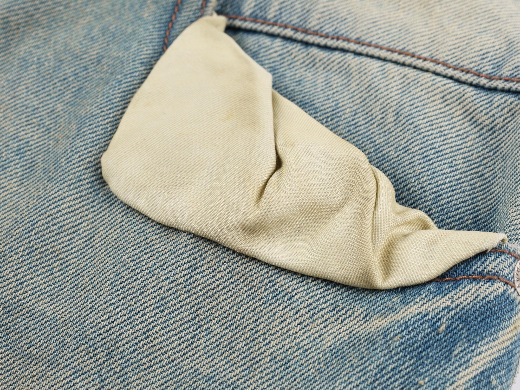 Pocket-flap washed denim jeans