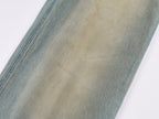 Pocket-flap washed denim jeans