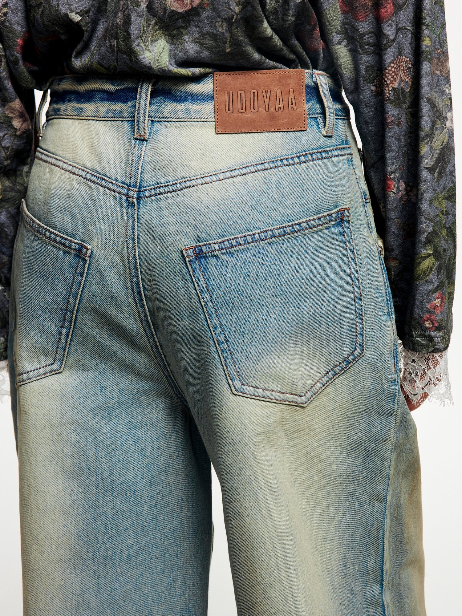 Pocket-flap washed denim jeans