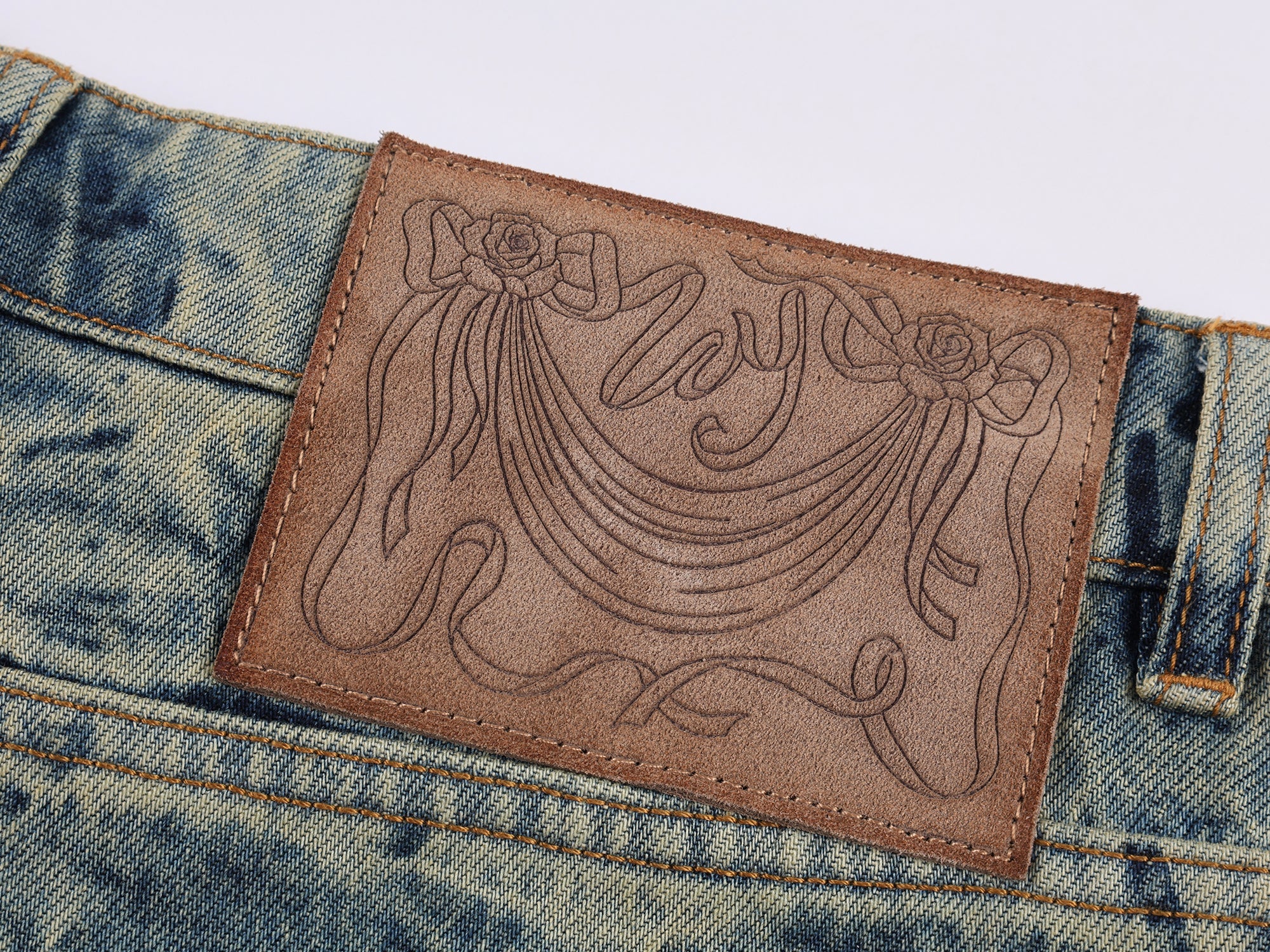 Tie-dye scimitar jeans