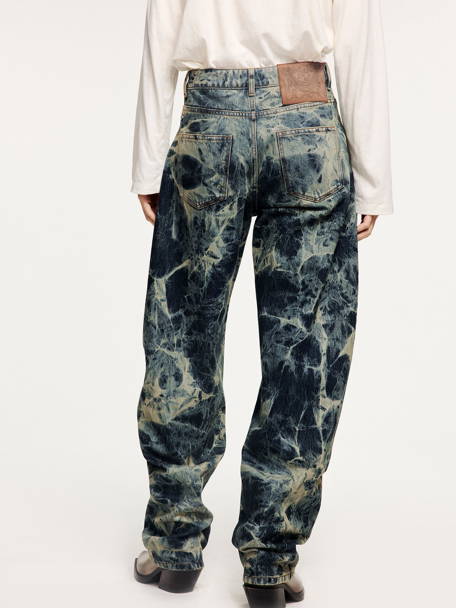 Tie-dye scimitar jeans