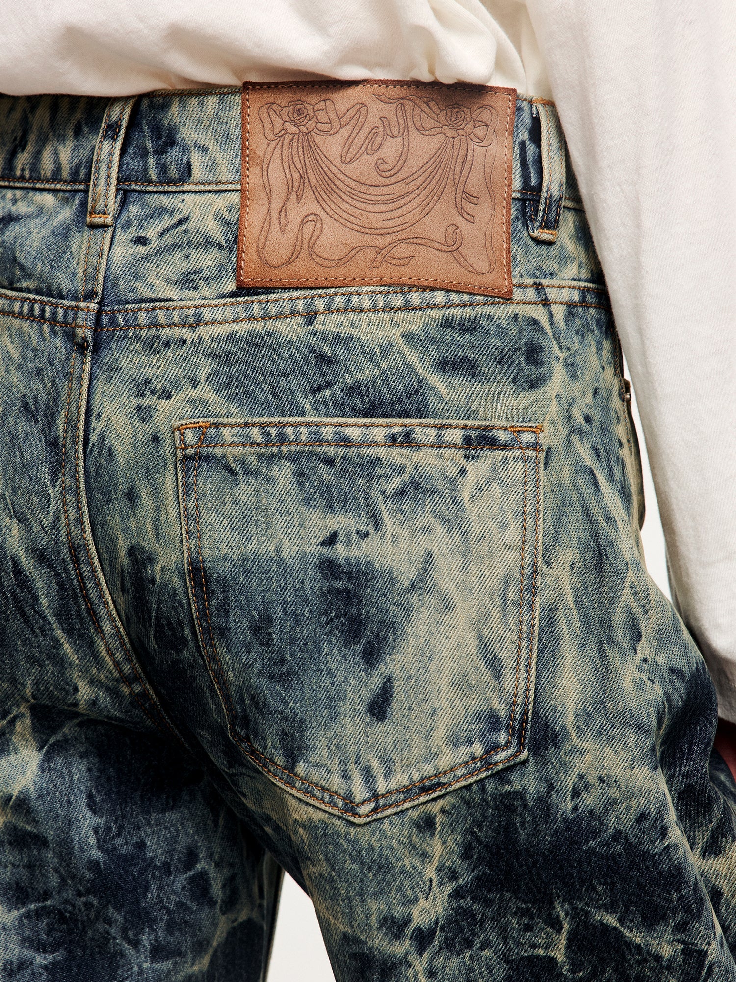 Tie-dye scimitar jeans