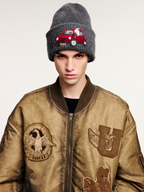 Tencel wool beanie with traveling puppy motif