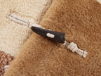 Faux fur panelled fisherman coat