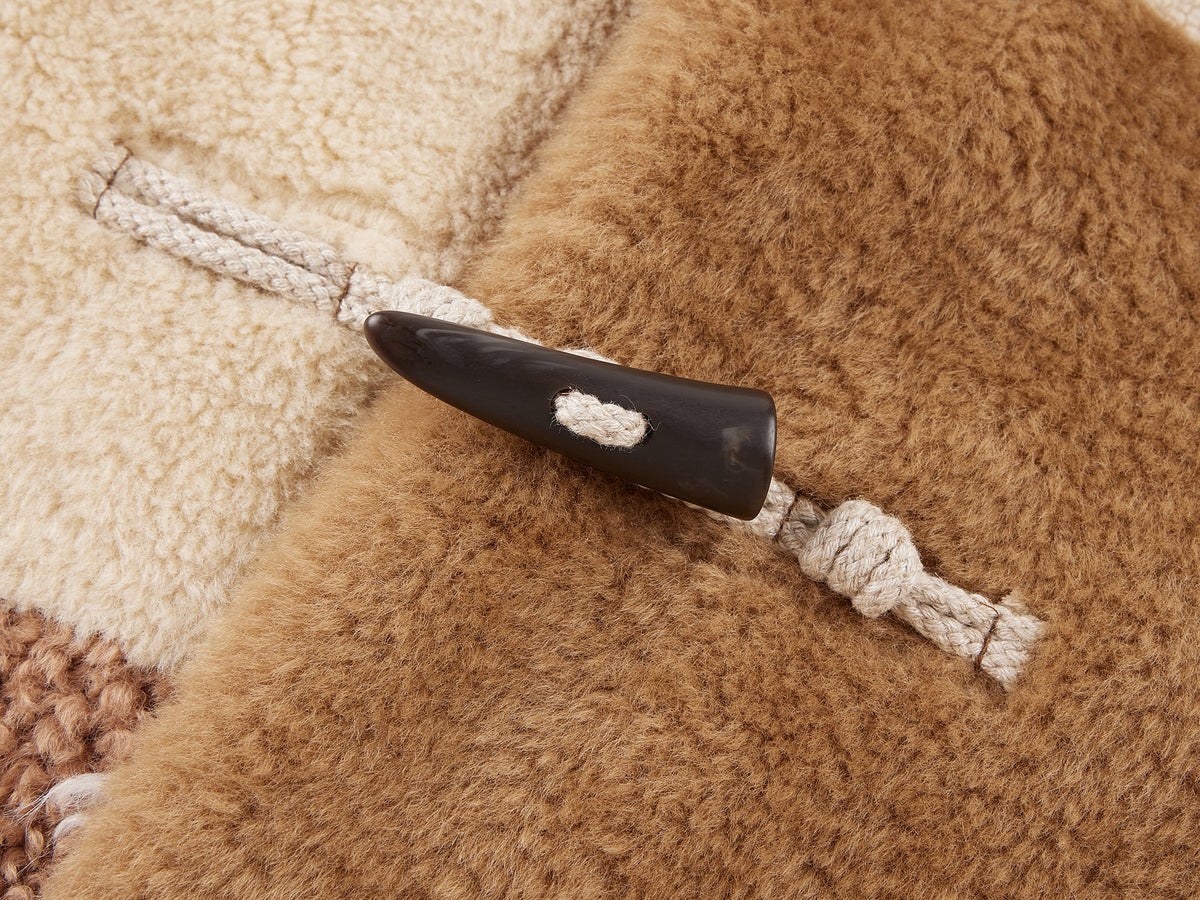 Faux fur panelled fisherman coat