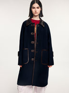Balmacaan wool coat