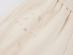 Distressed embroidered sweatpants