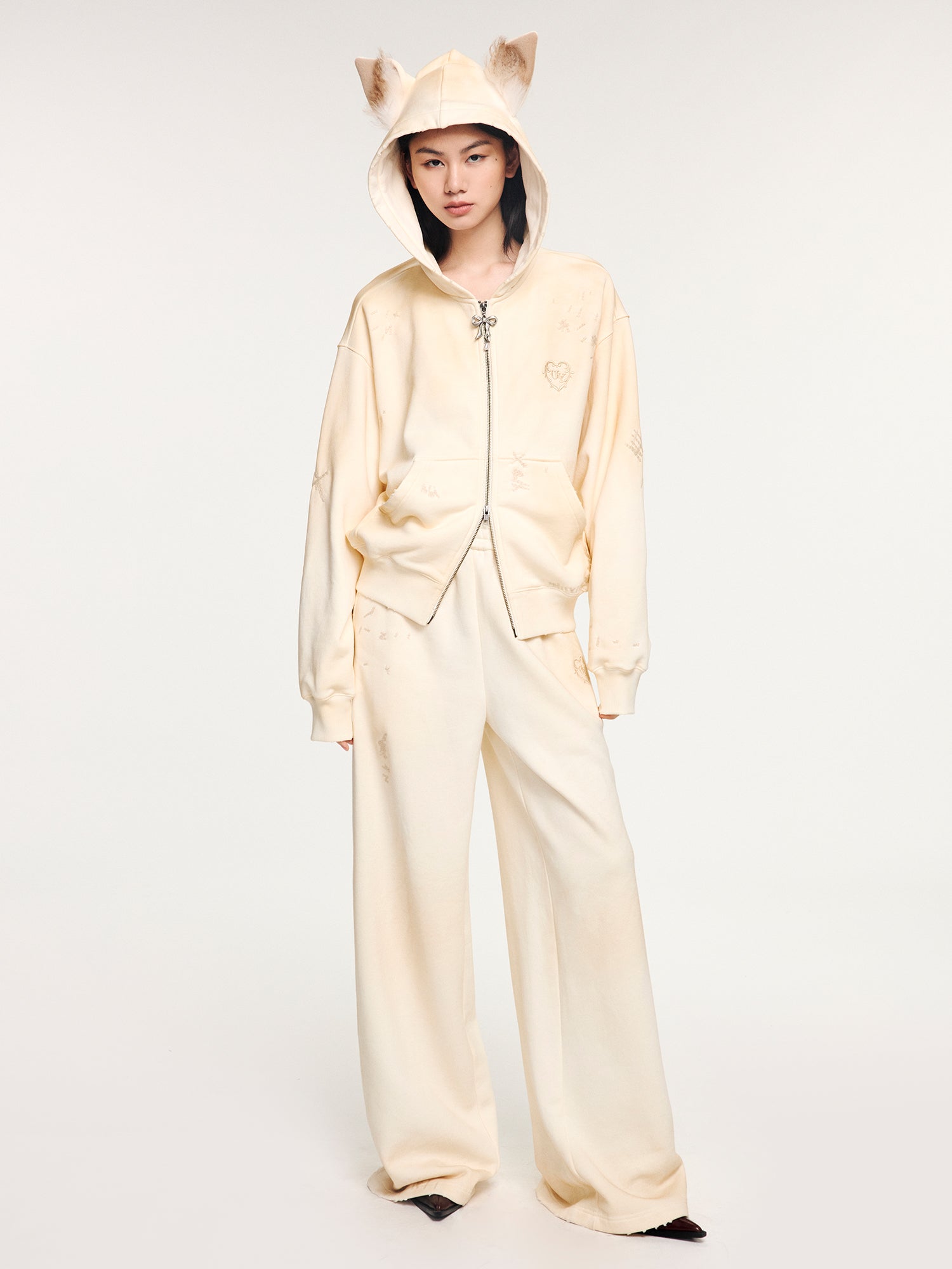 Distressed embroidered sweatpants