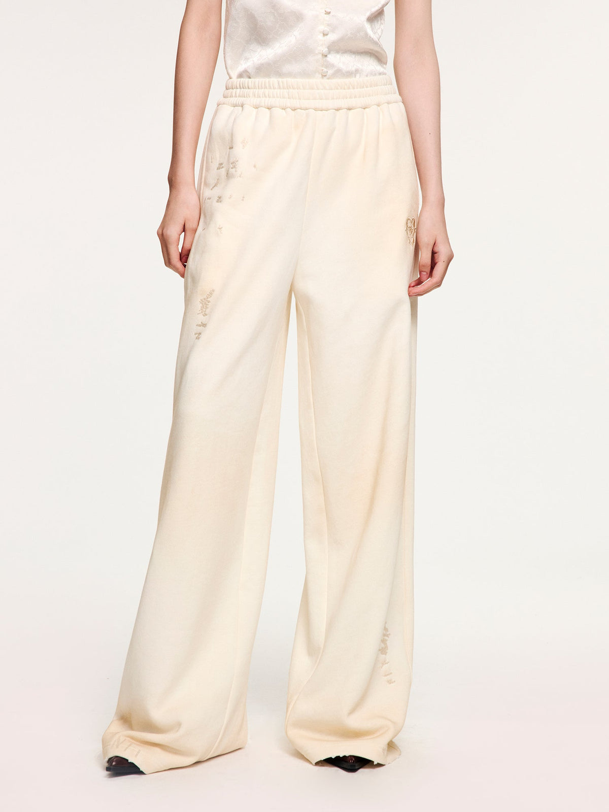 Distressed embroidered sweatpants