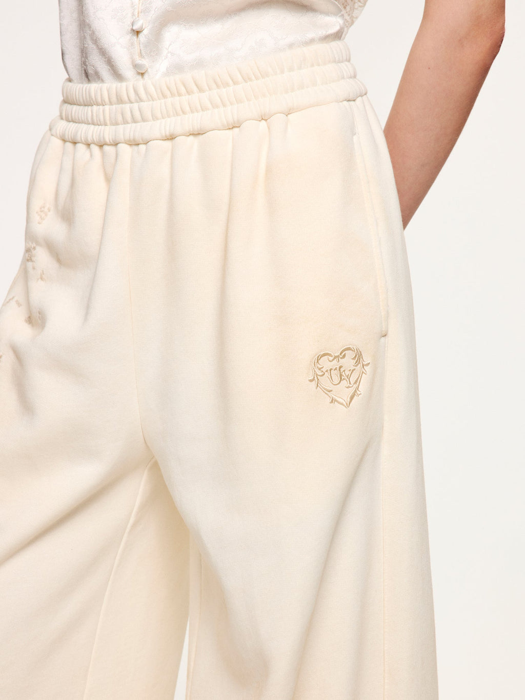 Distressed embroidered sweatpants