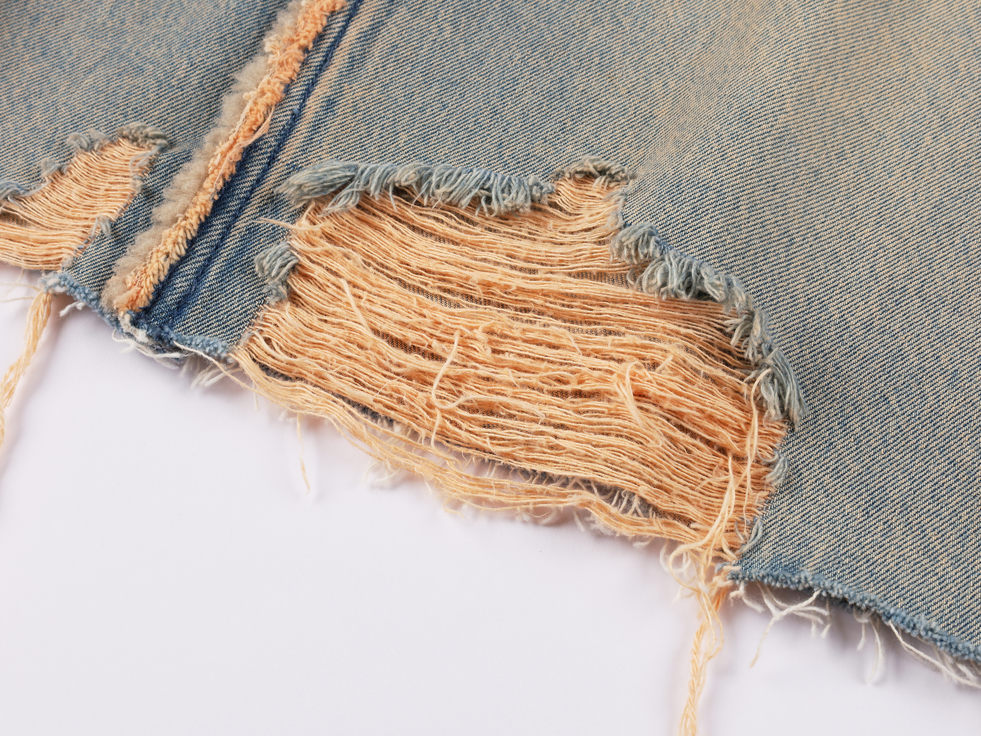 Washed raw-edge denim skirt