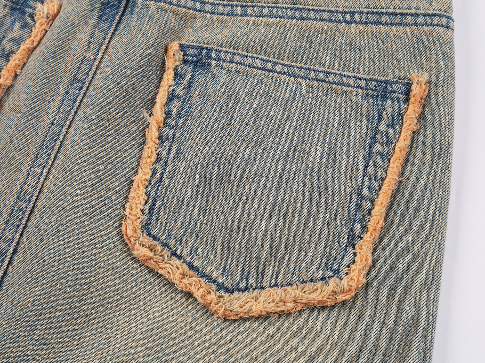 Washed raw-edge denim skirt