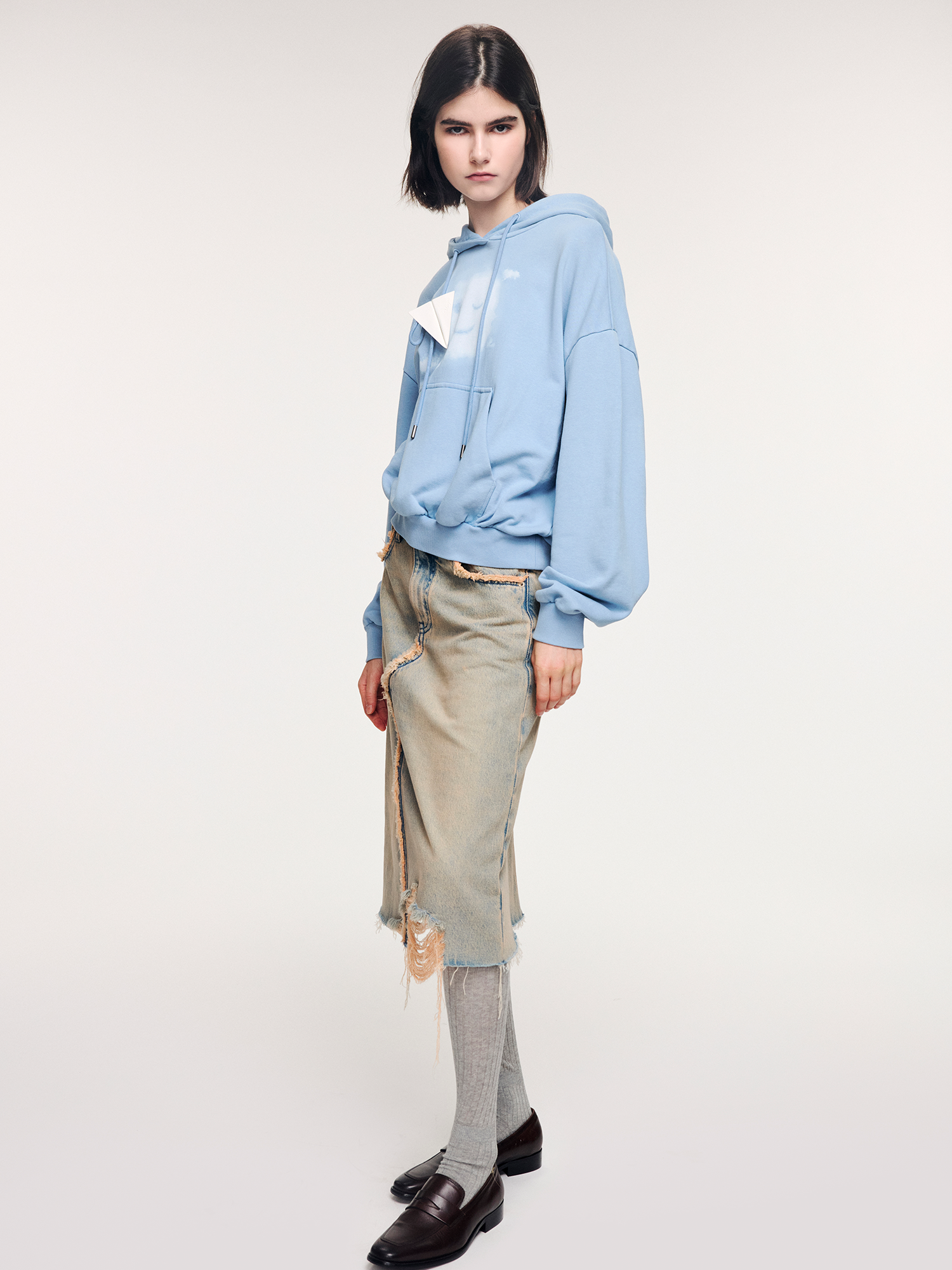 Washed raw-edge denim skirt