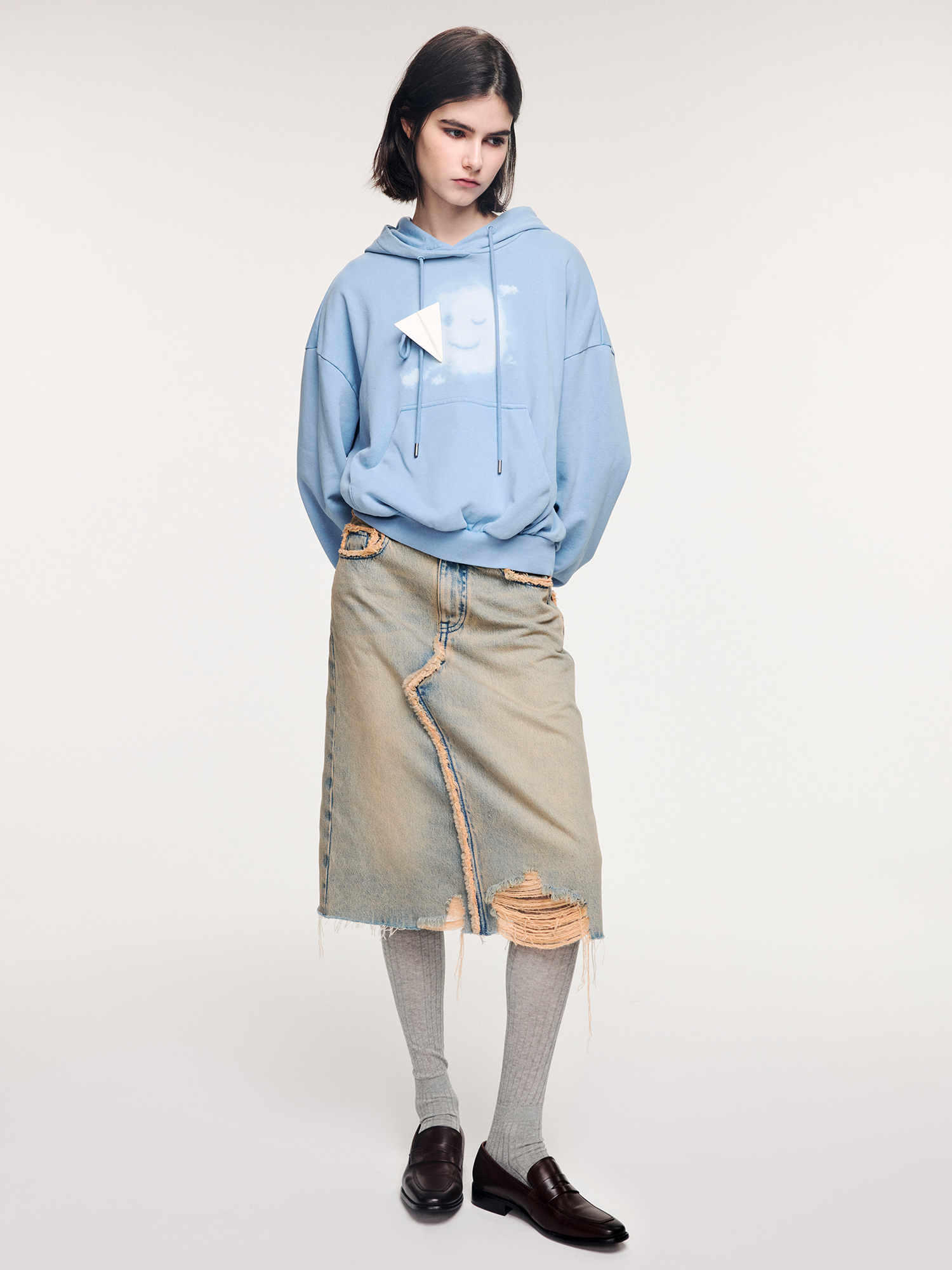 Washed raw-edge denim skirt