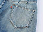 Irregular pleated denim skirt