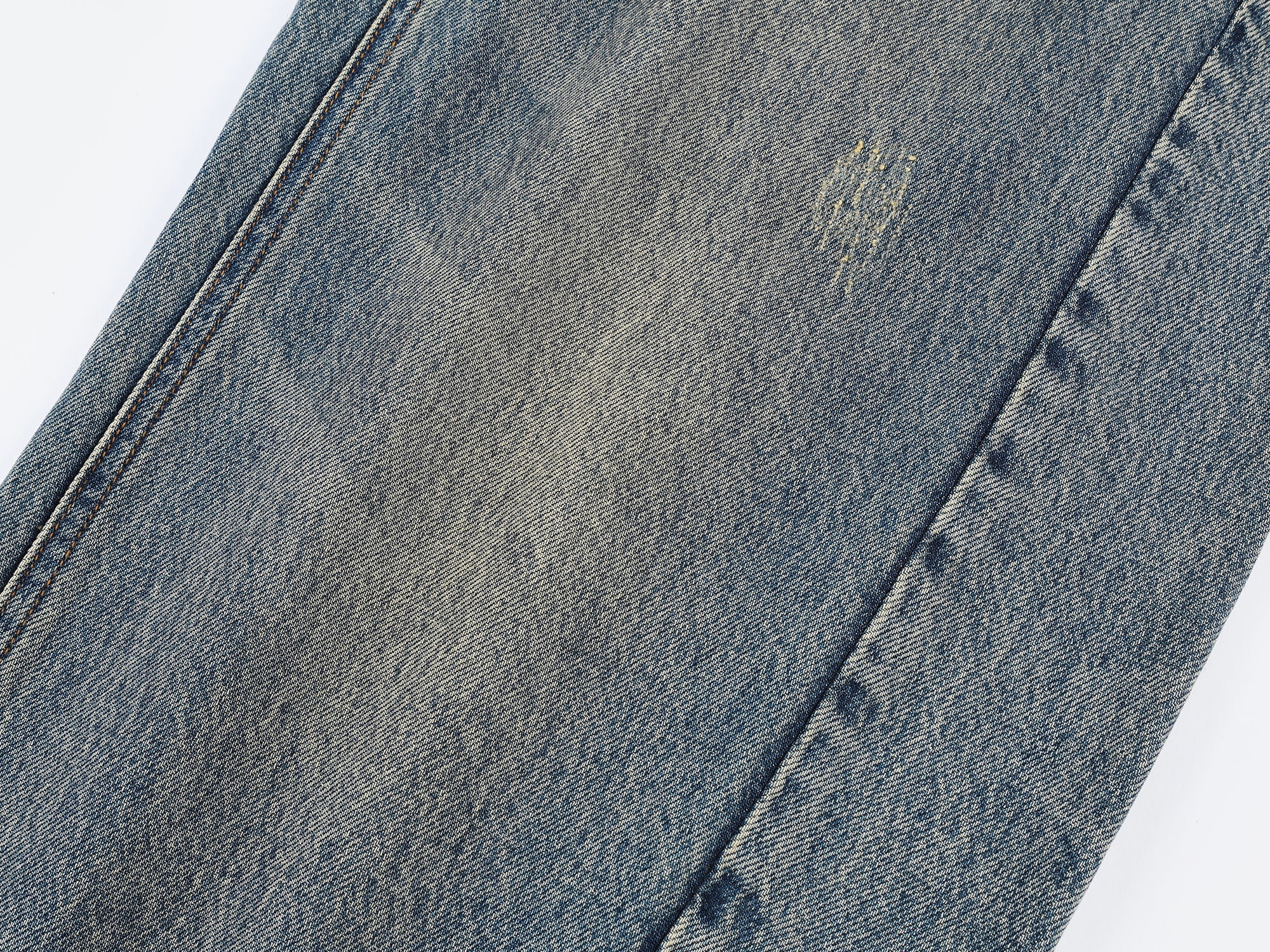 Washed Tencel denim jeans with curved blade cut