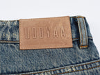 Washed Tencel denim jeans with curved blade cut
