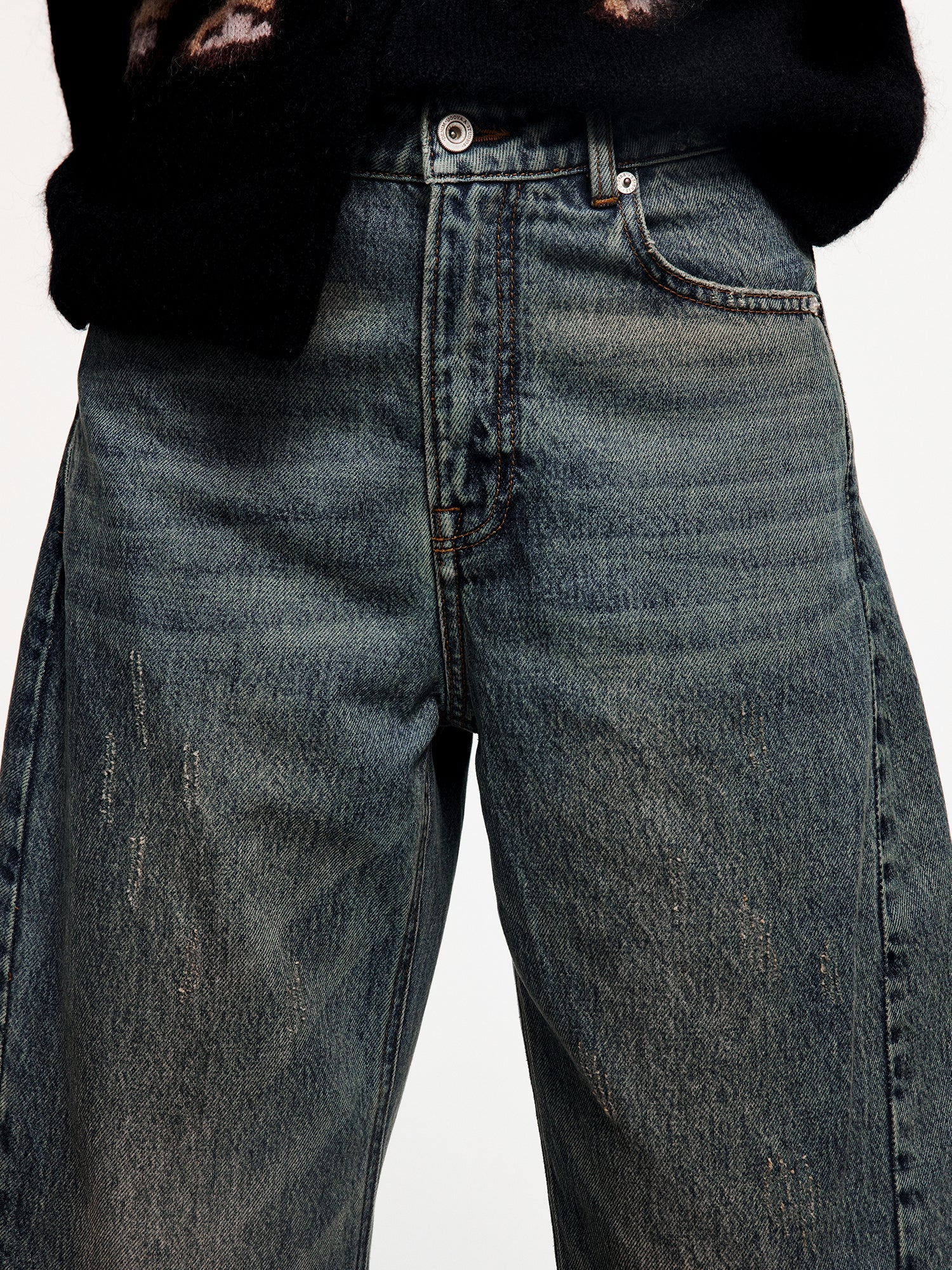 Washed Tencel denim jeans with curved blade cut