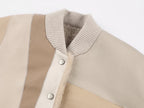 Reversible baseball jacket with shearling leather panels
