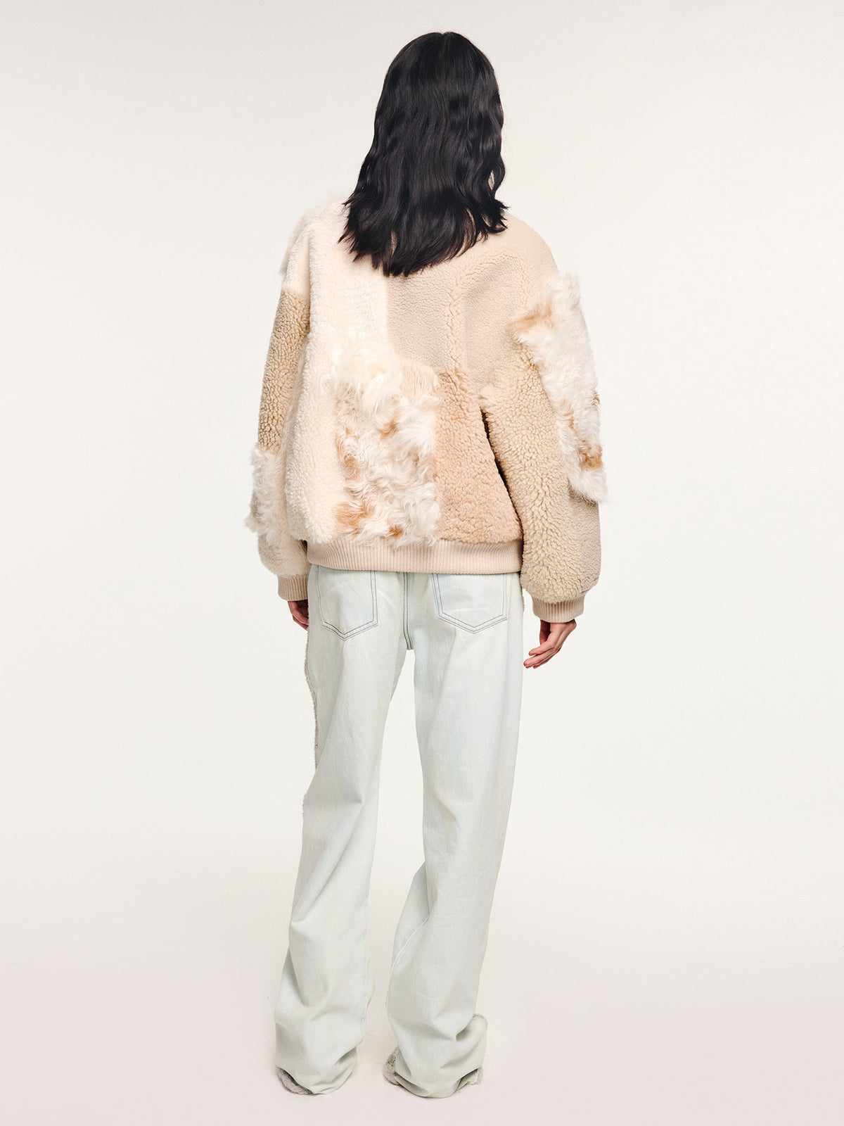 Reversible baseball jacket with shearling leather panels