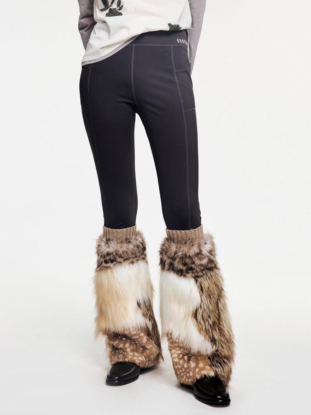 Yoga pants with faux fur sock-like cuffs