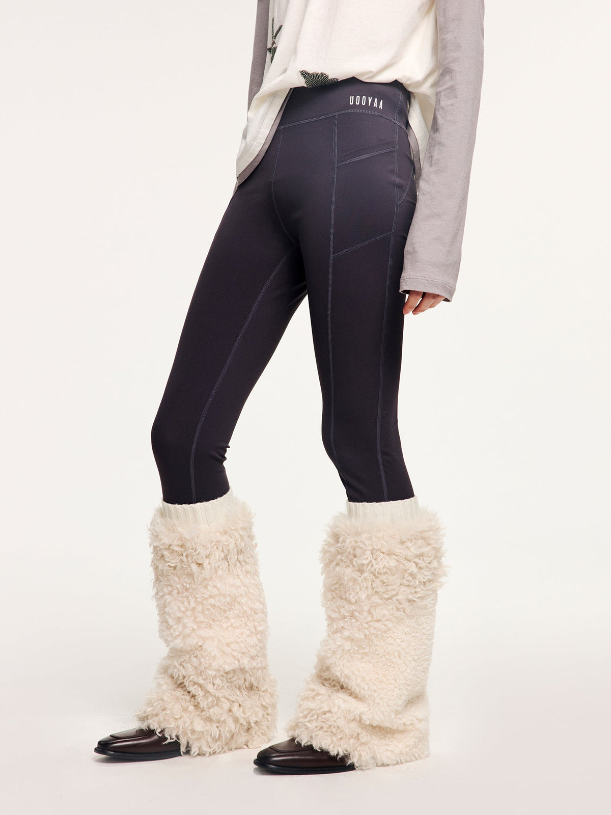 Yoga pants with faux fur sock-like cuffs