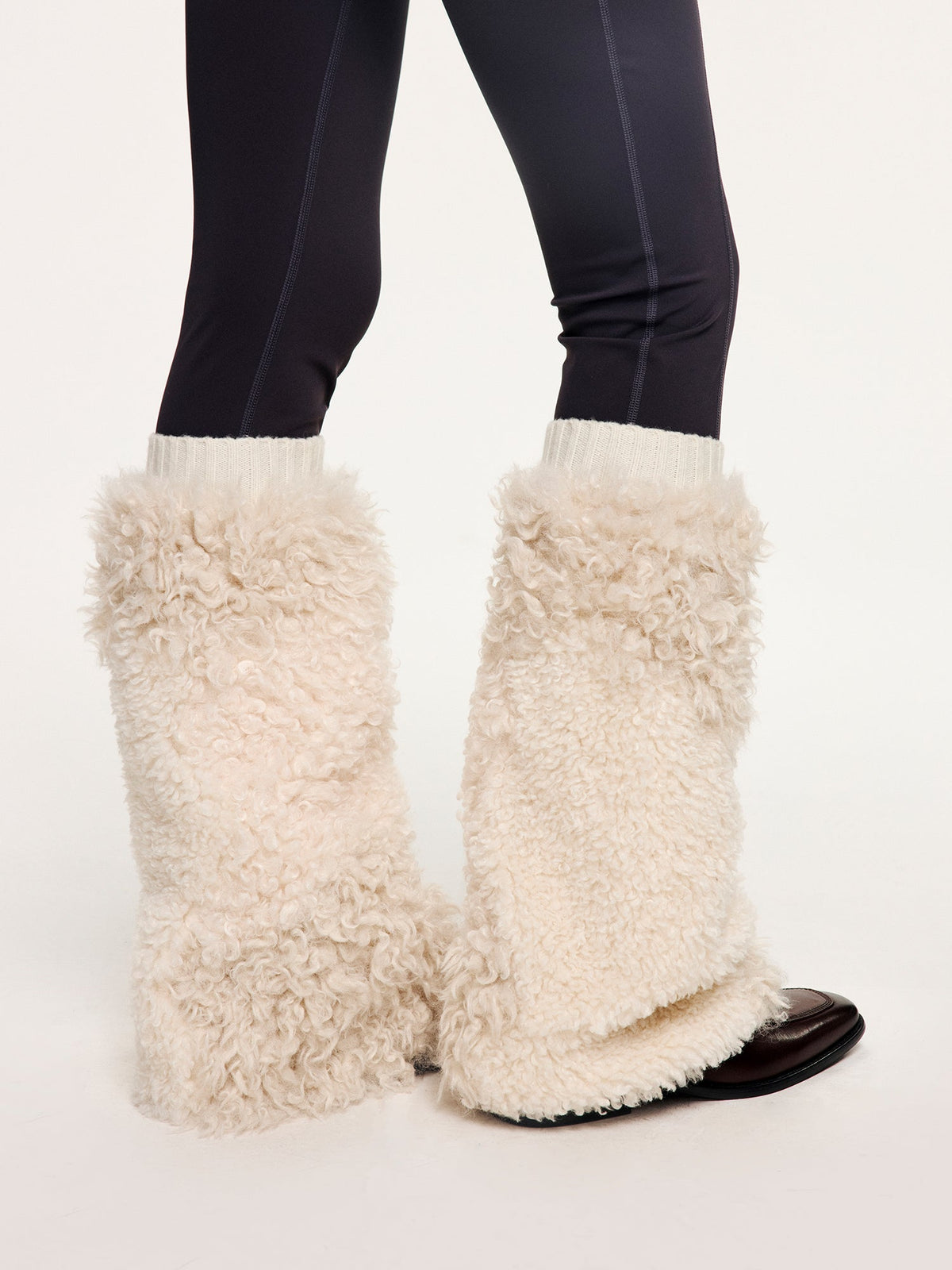 Yoga pants with faux fur sock-like cuffs