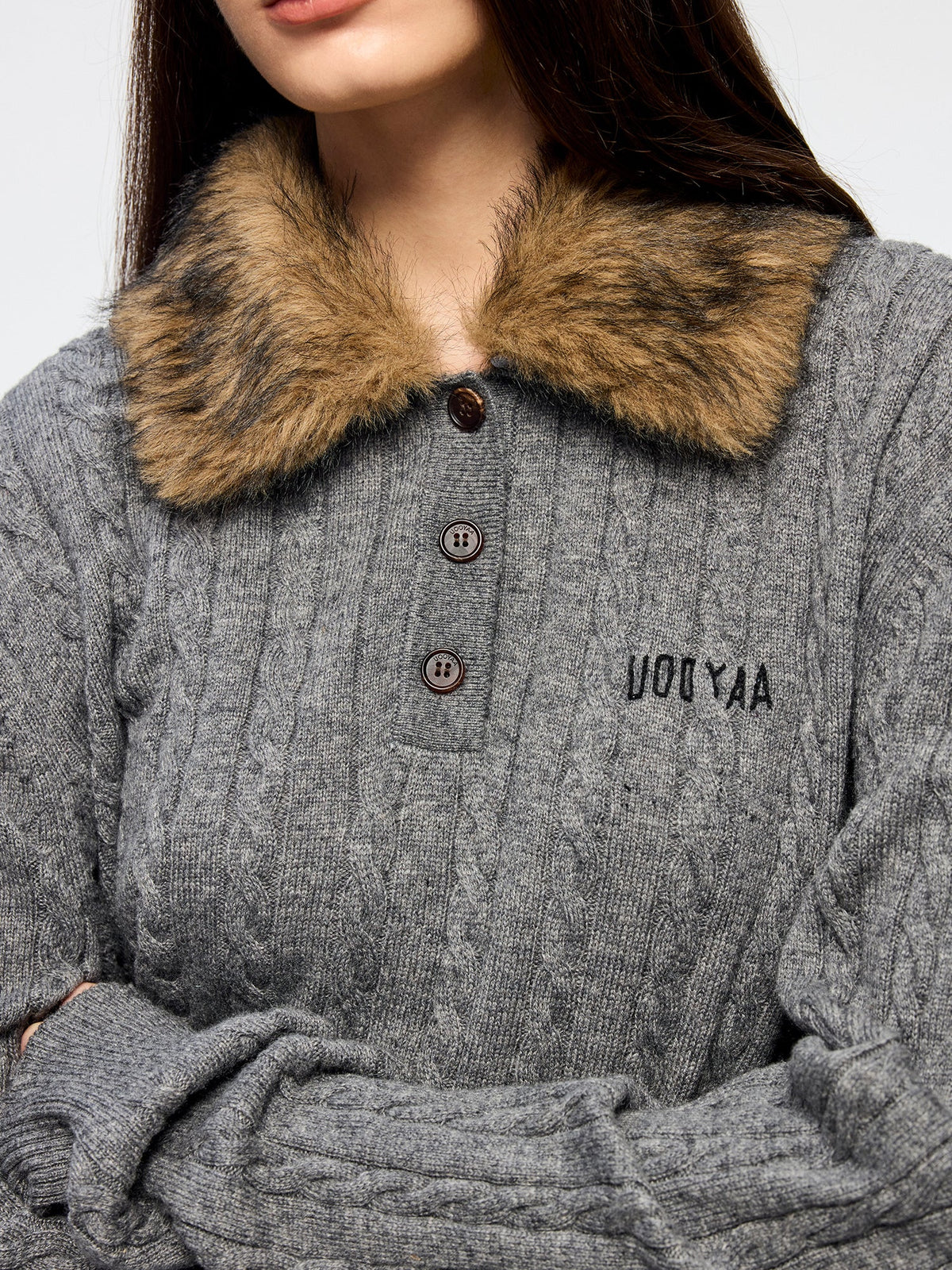 Cable knit polo pullover with fur collar