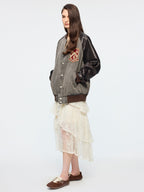 Baseball jacket with leather sleeves and badges