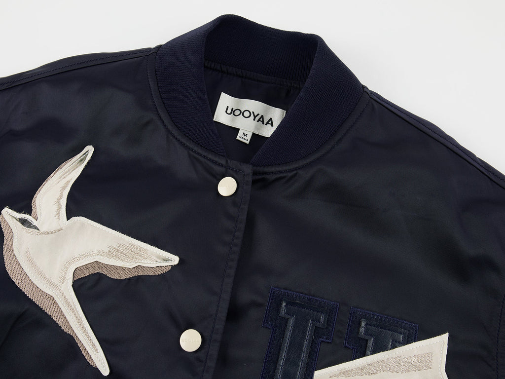 Origami bird PU leather applique baseball jacket