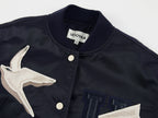 Origami bird PU leather applique baseball jacket