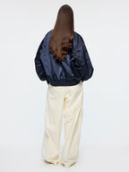 Origami bird PU leather applique baseball jacket