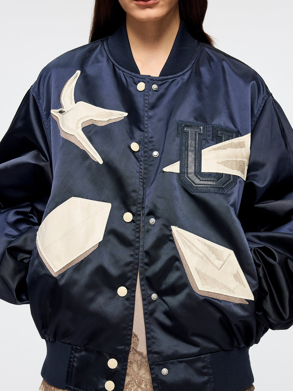 Origami bird PU leather applique baseball jacket