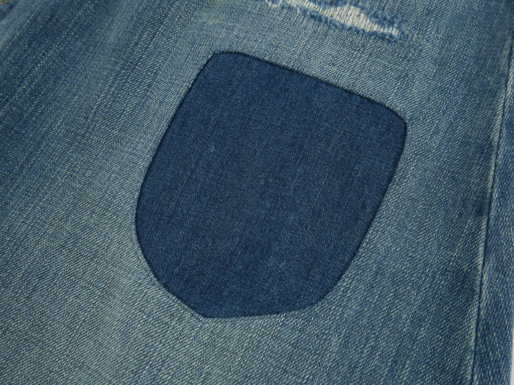 Distressed patchwork denim skirt