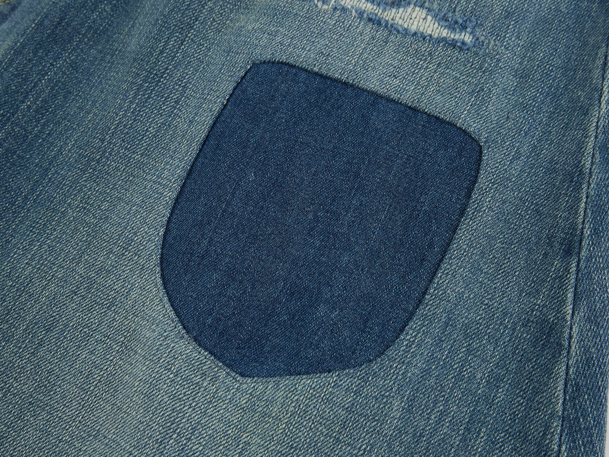Distressed patchwork denim skirt