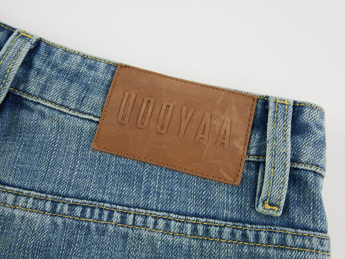 Distressed patchwork jeans
