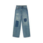 Distressed patchwork jeans