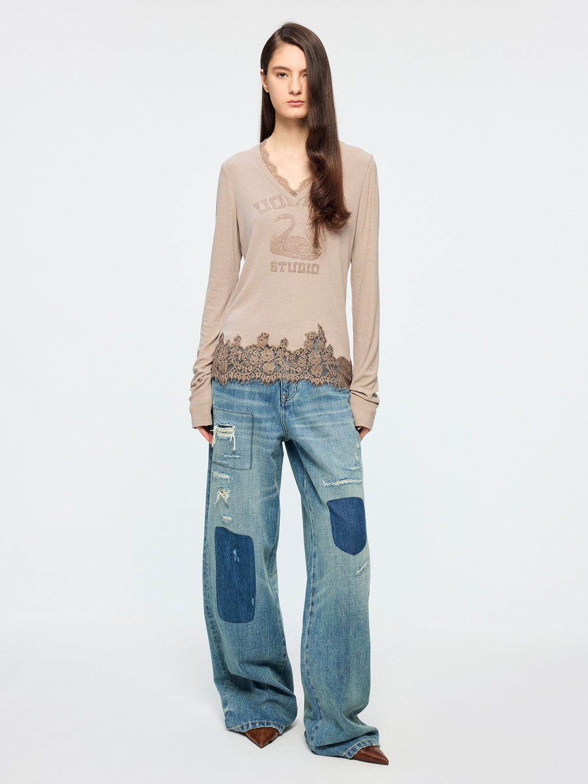 Distressed patchwork jeans