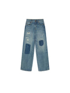 Distressed patchwork jeans