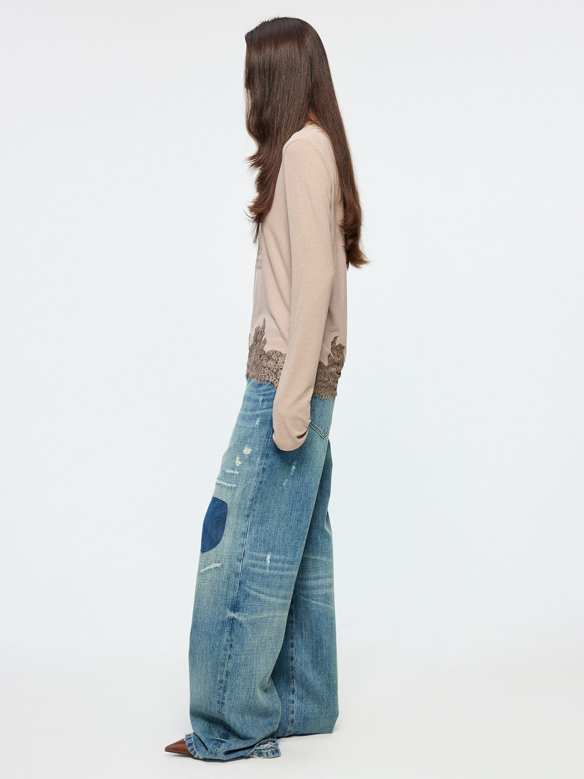 Distressed patchwork jeans