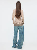 Distressed patchwork jeans