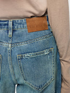 Distressed patchwork jeans