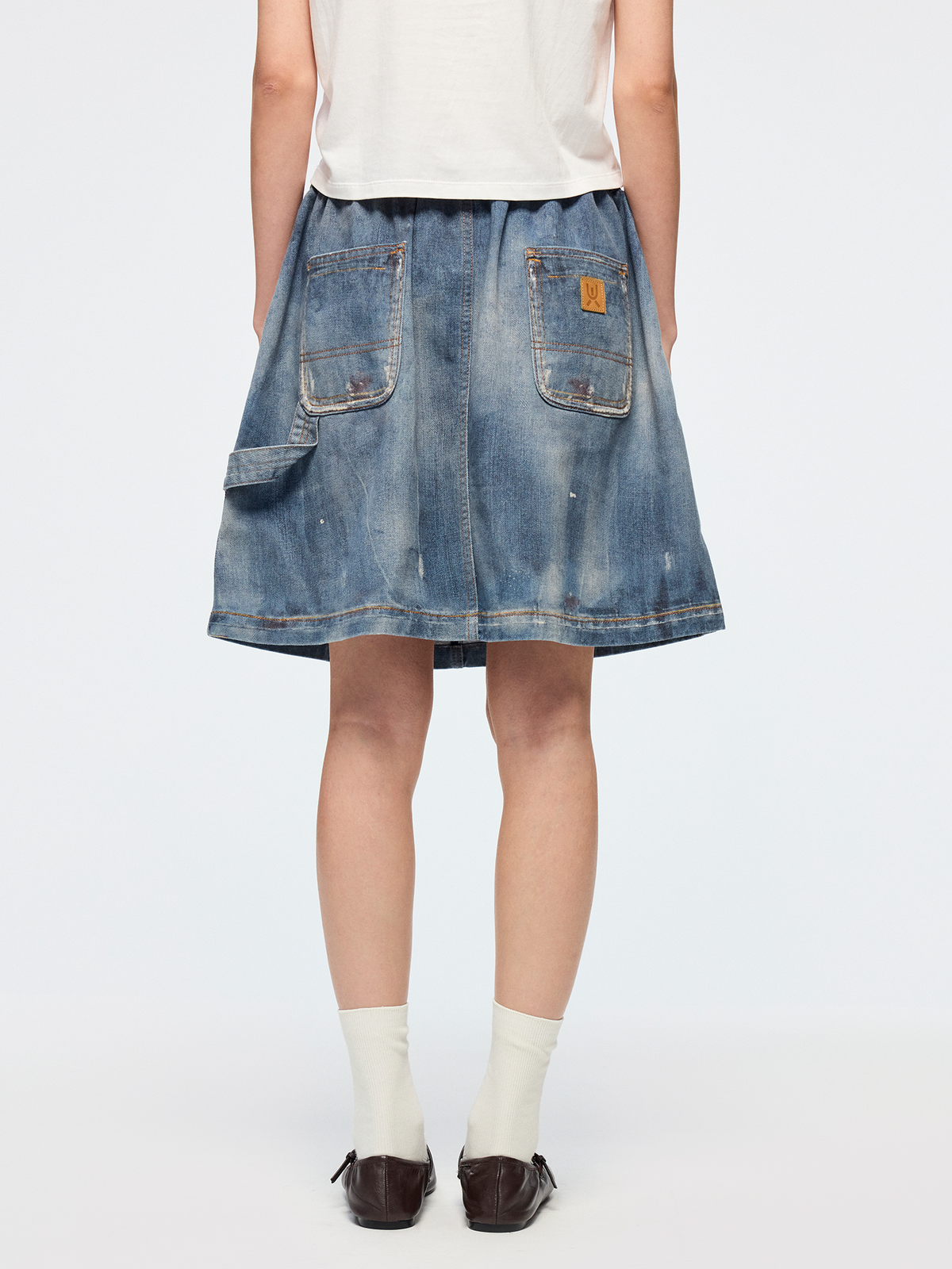 Surreal optical illusion denim mini skirt