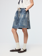Surreal optical illusion denim mini skirt